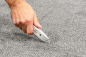 Preview: Floor installers knife with hook blade cutting carpet