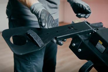 Preview: The hose and cable holder is a useful accessory for our floor grinding machines RO-300 and RO-400 to fix the suction hose and connection cable to the drawbar of the machine.