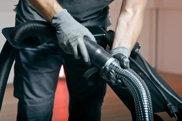 Preview: The hose and cable holder is a useful accessory for our floor grinding machines RO-300 and RO-400 to fix the suction hose and connection cable to the drawbar of the machine.